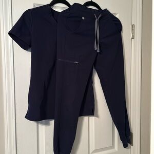 Navy figs blue extra extra small . Fit like a regular small.